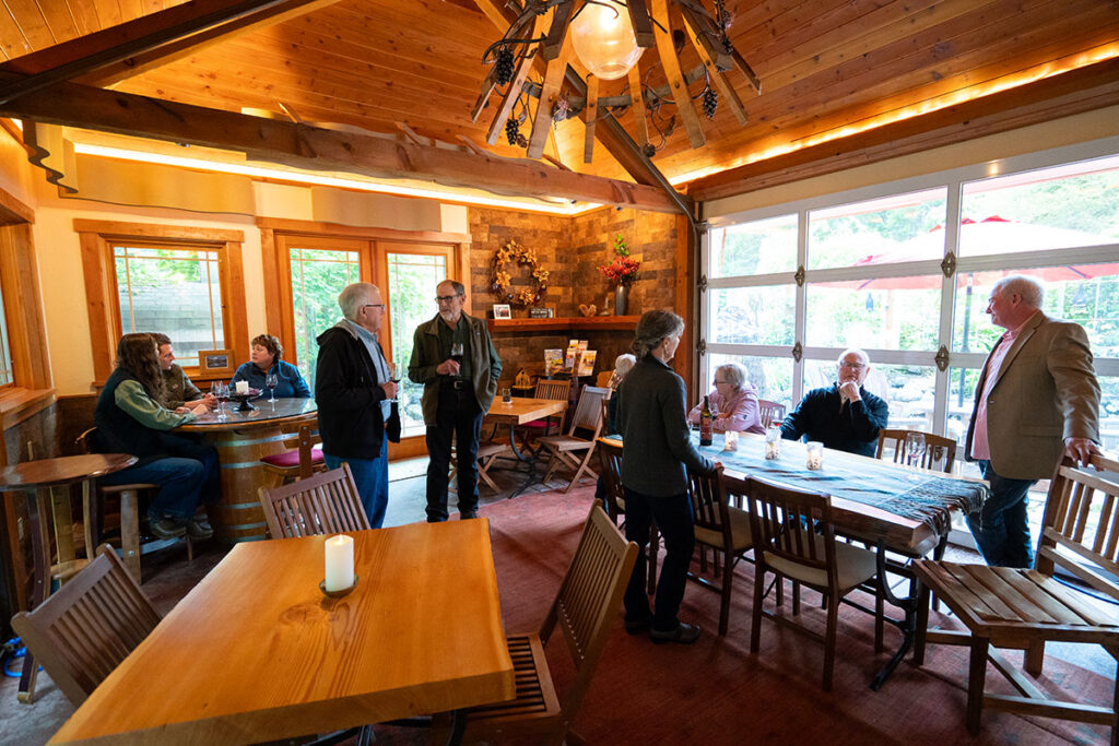 Guests talking in tasting room